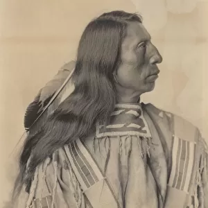 Portrait of Jack Red Cloud, a Sioux Indian, late 19th century. Creator: Frank A. Rinehart