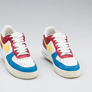 Red, white, yellow, and blue Nike sneakers worn by Big Boi of Outkast, 2005-2006