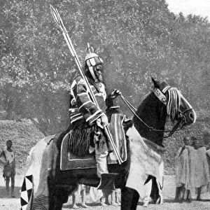 Royal bodyguard in ancient armour, northern Nigeria, 1936. Artist: Wide World Photos
