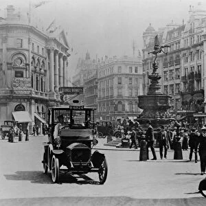 Unic taxi in Piccadilly circus, London circa 1910. Creator: Unknown