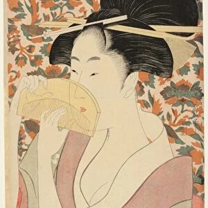 Woman Holding a Tortoise-shell Hair-comb, Japan, c. 1795 / 96. Creator: Kitagawa Utamaro