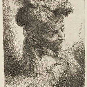 Young man facing three quaters right wearing a fur headdress with a plume, jewel... ca