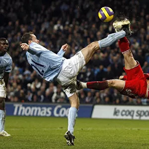 Fernando Torres overhead kick is blocked by Manchester City's Didi Hamann