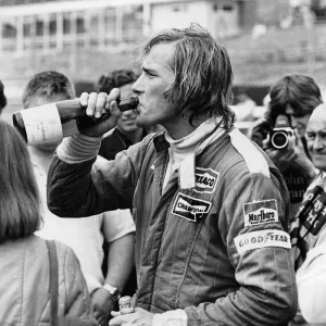 James Hunt swigging champagne