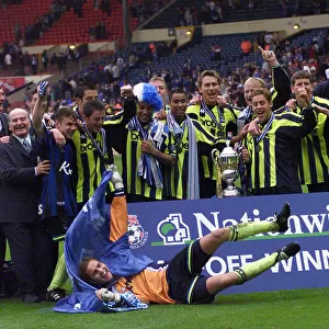 Manchester City celebrate promotion in 1999
