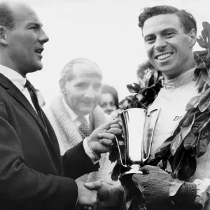 Jim Clark accepts trophy from Sir Stirling Moss Print Jim Clark accepts trophy from Sir Stirling Moss Print
