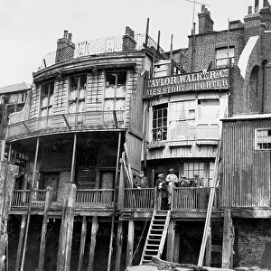 The old barge office and the Grapes Public House at Limehouse in London in 1924