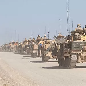 A convoy of Warrior infantry fighting vehicles (IFVs) patrolling near Musa Qala, Afghanistan