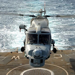 A Lynx MK8 Helicopter Lands Onboard HMS Cornwall
