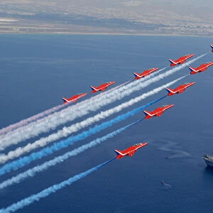 Red Arrows flying over HMS Illustrious