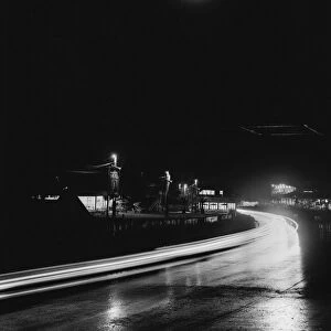 1951 Le Mans 24 hours: The clock shows the time at night in the rain, atmosphere
