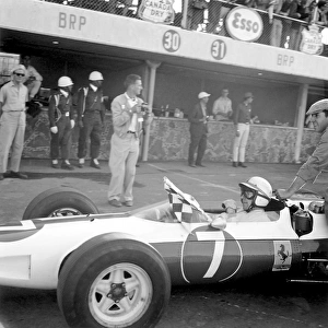 1964 Mexican Grand Prix - John Surtees: John Surtees becomes the only man to win World Championships on motorbikes and in a car