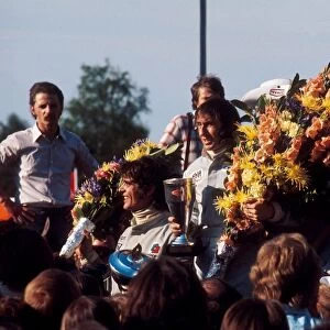 1973 Belgian Grand Prix: Jackie Stewart 1st position, Francois Cevert 2nd position and Emerson Fittipaldi 3rd position on the podium