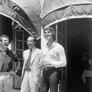 1973 Monaco Grand Prix: Francois Cevert and Bernard Cahiershare a joke. Portrait