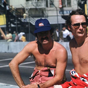 1976 US GP EAST - LONG BEACH NIKI LAUDA WITH TEAM MATE CLAY REGAZZONI. PHOTO: LAT