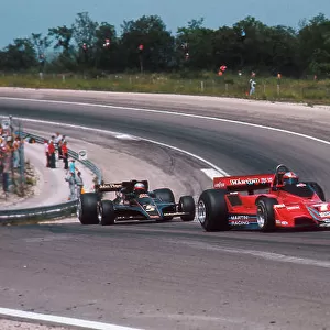 1977 French Grand Prix. Dijon-Prenois, France. 1-3 July 1977. John Watson (Brabham BT45B Alfa Romeo) leads Mario Andretti (Lotus 78 Ford). Ref-77 FRA 22. World Copyright - LAT Photographic