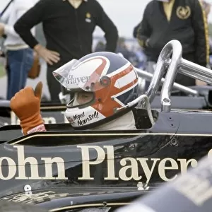 1981 Canadian Grand Prix. Montreal, Canada. 25-27 September 1981. Nigel Mansell (Lotus 87-Ford Cosworth), retired. In the pits with Colin Chapman and Peter Collins. World Copyright: LAT Photographic Ref: 35mm transparency 81CAN21