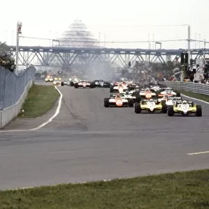 1982 Canadian Grand Prix. Montreal, Canada. 13 June 1982. Rene Arnoux, Renault RE30B, retired, and Alain Prost, Renault RE30B, retired, lead at the start, action. World Copyright: LAT Photographic Ref: 35mm transparency 82CAN