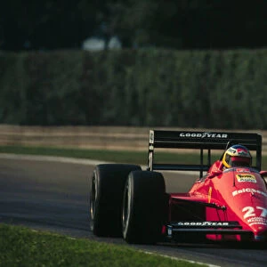 1988 ITALIAN GP. Michele Alboreto, Ferrari, finishes 2nd on the podium behind team