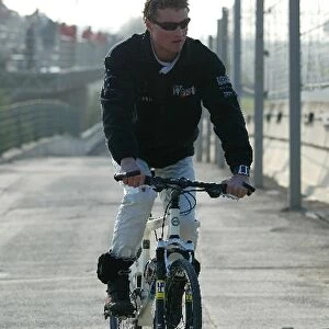Formula One Testing: David Coulthard McLaren rides a bike
