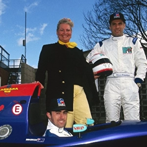 Formula One World Championship: David Brabham with team mate Roland Ratzenberger stand with Barbara Behlau, a sports manager based in Monaco