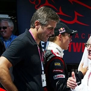 Formula One World Championship: George Clooney Actor, who is promoting the film Oceans Twelve with the Jaguar team, talks with Bernie Ecclestone