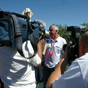 Formula One World Championship: Keith Sutton F1 Photographer is interviewed by Japanese TV on his 45th birthday