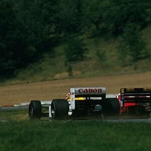 Formula One World Championship: Nelson Piquet Williams FW11B and Gerhard Berger Ferrari F1 / 87 slog it out