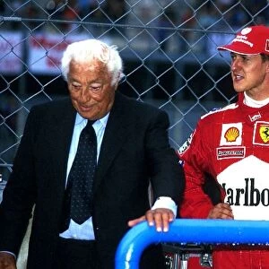 Formula One World Championship: President of FIAT Gianni Agnelli with Michael Schumacher Ferrari