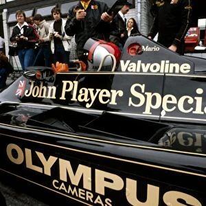 Formula One World Championship: Race winner Mario Andretti Lotus 79 talks with Colin Chapman Lotus Team Owner in the pits