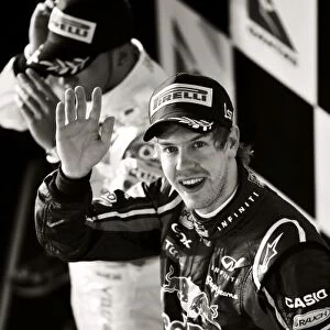 Formula One World Championship: Race winner Sebastian Vettel Red Bull Racing celebrates on the podium
