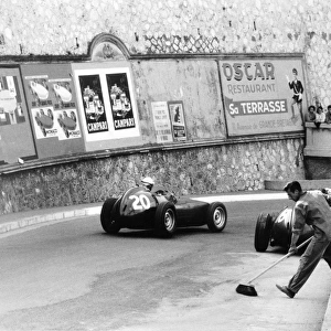 Monte Carlo, Monaco. 10 May 1959: Ron Flockhart, #20 BRM P25, retired, passes Harry Schell, BRM P25, retired, action