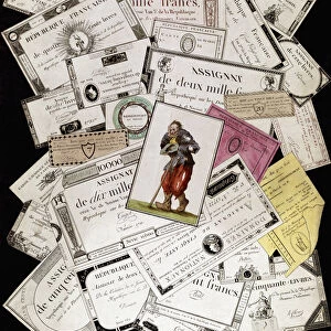 Assignats, paper bills issued as currency from 1789 to 1796 during the French Revolution. They were initially backed by the value of expropriated properties, but as those properties were sold and still more assignats were issued the system succumbed to inflation. The Tarot card of The Fool, or The Beggar, on top of the assignats sums up the poor mans lot during the latter years of the assignats hyperinflation