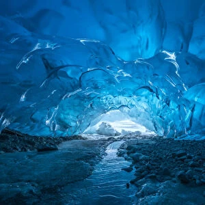 Blue glacial ice inside an ice cave, Tongass National Forest, Alaska, USA