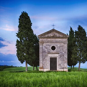 Chapel of Vitaleta with Cypress Trees at dusk after sunset. Chapel of Vitaleta, Val d┼¢Orcia, Siena Province, Tuscany, Italy
