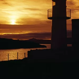 Dingle Lighthouse, Dingle Peninsula, County Kerry, Ireland; Lighthouse At Sunset