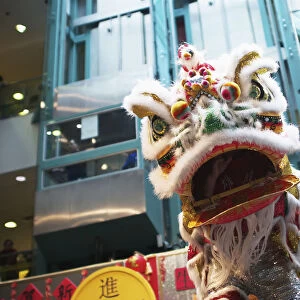 The Dragon Dance Is Performed By The Hong Luca Kung Fu Association During The Opening Ceremonies For The Chinese New Year In The Chinatown Centre; Toronto, Ontario, Canada