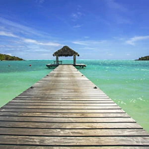 A jetty at a tropical beach resort in the Caribbean