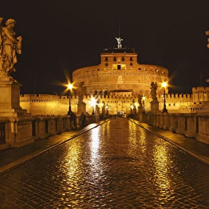 Night Lights Of The Bridge Across The Tiber River To Castel Sant angelo; Rome Lazio Italy