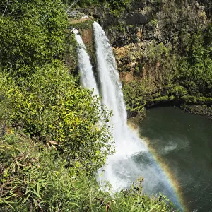 A Rainbow Adorns Wailua Falls; Kauai, Hawaii, United States Of America