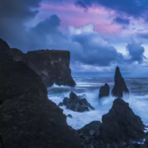 Sunset Over The Wild Ocean Along The Southwest Coast Of Iceland; Iceland