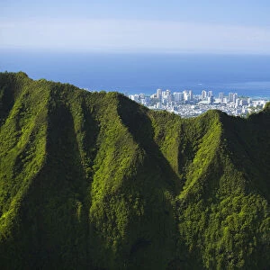 USA, Hawaii, Oahu, Aerial view of city overlooking Koolau Mountains; Honolulu