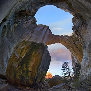Rock arch at sunrise, La Ventana Arch, El Malpais National Monument, New Mexico