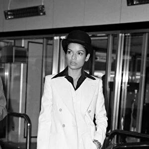 00092485 Bianca Jagger, wife Mick Jagger, in white suit