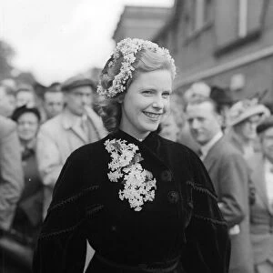1953 Clothing Ascot Fashion. Lady Osborne wore a head-dress of flowers with a spray to