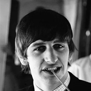 7 February 1964 Ringo Starr on the aircraft to New York