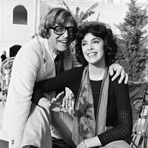 Actor Michael Caine with Nadia Cassini on the set of their new film Pulp during filming