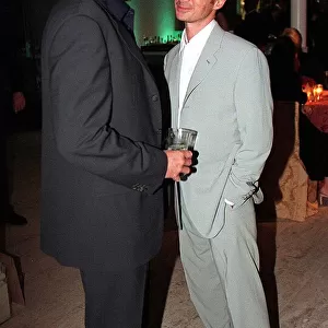 Actor Pierce Brosnan August 1999 with Robert Carlyle at the premiere party in