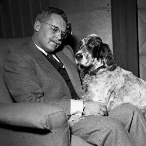Actor Rod Steiger with his pet springer spaniel February 1957