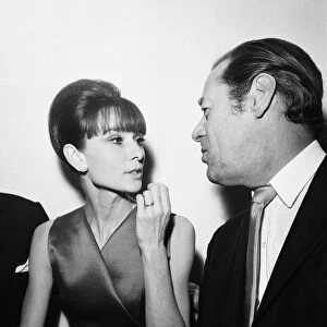 Actress Audrey Hepburn pictured with Rex Harrison at a press reception at the Savoy Hotel